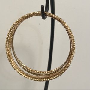 Gold Tone Women etched 7 stackable bracelets bangles. Used.